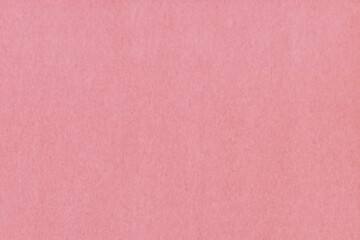 Clean red retro paper background. Vintage cardboard texture. Grunge paper for drawing. Simple blank fabric pattern.