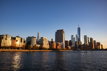 Fototapeta na wymiar Beautiful Tribeca and Lower Manhattan New York City Skyline along the Hudson River during a Sunset