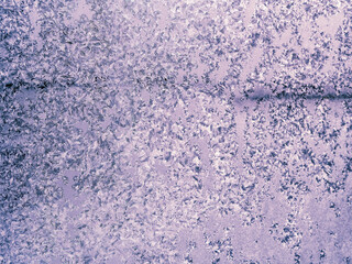 Frosty winter patterns on window glass. Close-up.