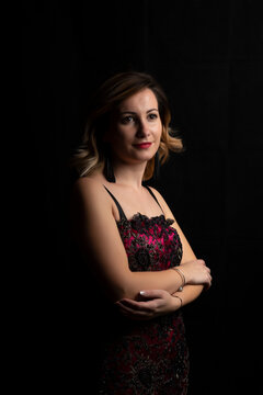 Young lady smiling whit black background