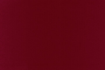 Clean red retro paper background. Vintage cardboard texture. Grunge paper for drawing. Simple blank fabric pattern.