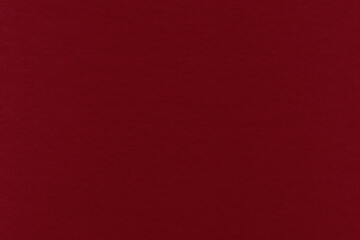 Clean red retro paper background. Vintage cardboard texture. Grunge paper for drawing. Simple blank fabric pattern.