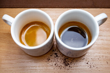 Two cups of coffee with aromatic espresso and Americano