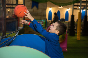 A child plays basketball. © vikitora_sap