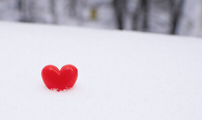 Bright red hearts on natural white snow. Copy space. Happy Valentine day and love concept.Greeting...