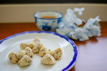 Traditional Dessert.Thai Shortbread Cookies. Khanom Kleeb Lumduan look like Flowers.