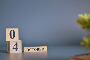 October 4, Cover in the evening time, Date Design with number cube for a background.