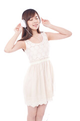 Portrait of a Young women listening music,smiling