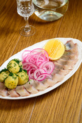 herring with potatoes and onions-a classic combination