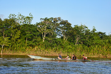 Longtail boat on the Tambopata River, Tambopata National Reserve, Peruvian Amazon 