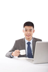 Portrait of young Businessman drinking coffee portrait