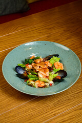 salad with oysters, shrimps and vegetables
