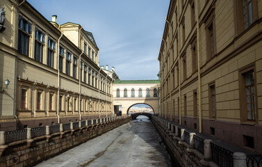 Naklejka na ściany i meble Ancient buildings on the banks of the Zimnyaya Kanavka canal in St. Petersburg.