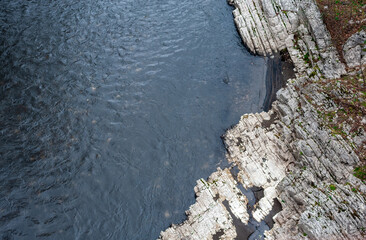 Natural texture: rock on the bank of a mountain river.