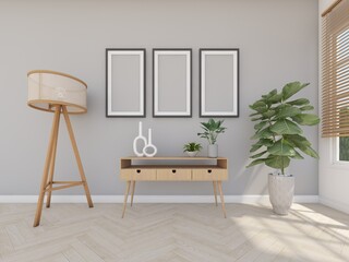 wood desk in the grey room with ficture frame and floor lamp