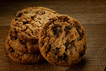 Pile of Cookies on Wooden Background