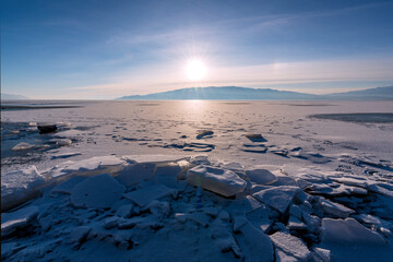 sunrise over frozen Utah lake