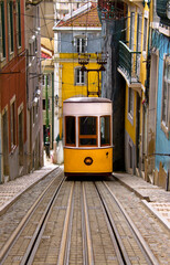 Fototapeta premium Vertical view of the Bica Funicular (Elevador da Bica), Lisbon, Portugal. Space for text.