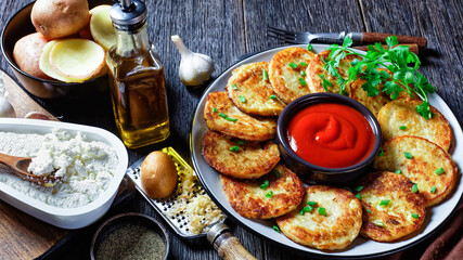 Potato pancakes with cottage cheese on a plate