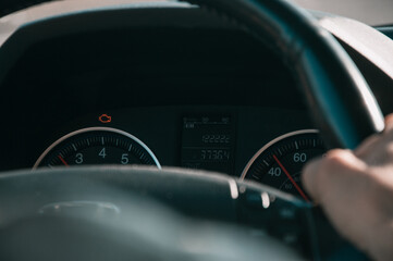Car dashboard, car speedometer, check engine
