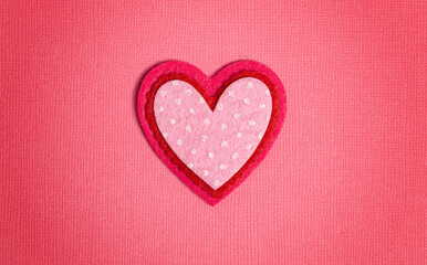 Simple Background with Felt Love Hearts on Pink Background