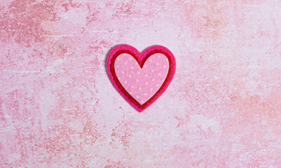 Simple Background with Felt Love Hearts on Pink Background