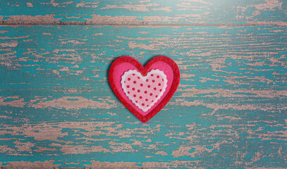 Simple Background with Felt Love Hearts on a Wood Table