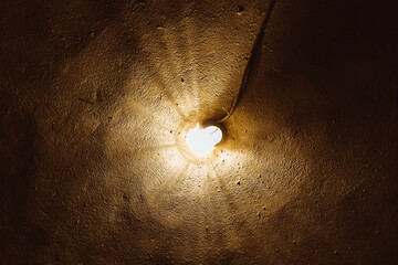Lamp and wire on the wall, top view.