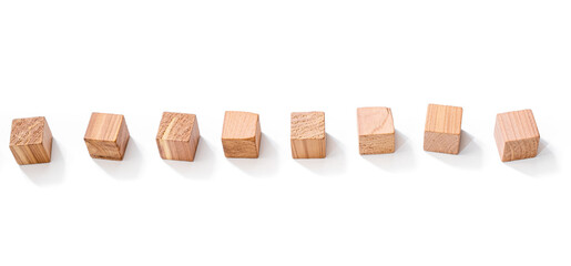 Wooden cubes in row isolated on white