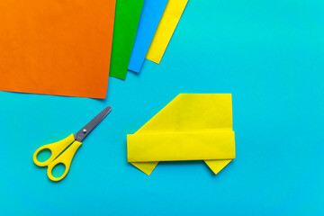 Step by step photo instruction how to make origami paper car. Simple diy with kids children's concept.
