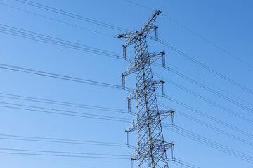 Tower high voltage line under the background of blue sky
