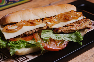 
Colombian fast food. mixed meat sandwich, with fresh vegetables