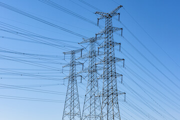 Tower high voltage line under the background of blue sky