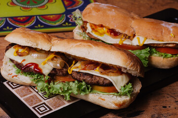 
Colombian fast food. mixed meat sandwich, with fresh vegetables
