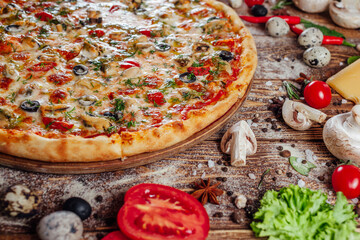 fresh pizza on the boards