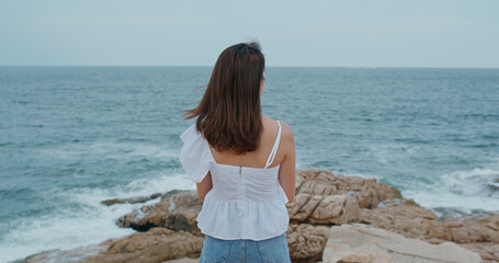 Fototapeta na wymiar Woman enjoy the sea view