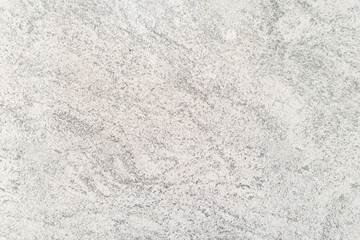 Abstract weathered texture stained old stucco light gray and aged paint white brick wall background in rural room.