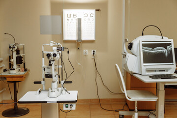 View of the ophthalmic microscope on the table in the ophthalmologist's office. Modern diagnostics and treatment of vision. Diagnostic microscopic medical equipment.