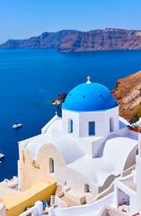 Fototapeta premium Greek church on the coast of Santorini in Greece