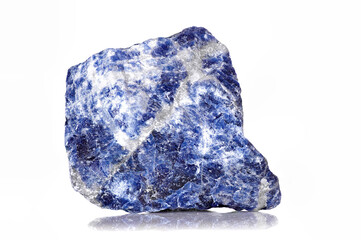 
Amazing closeup macro of colorful blue veined sodalite mineral 
stone specimen isolated on white...
