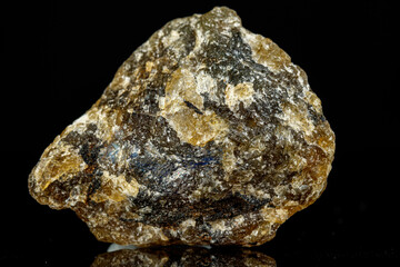 macro mineral stone Labradorite on a black background