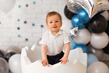 Obraz premium First birthday baby boy party