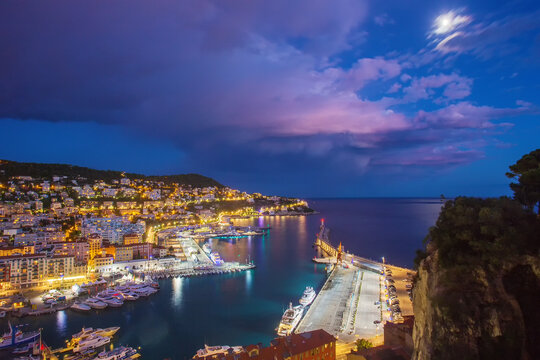 Awe landscape with entrance to harbor of Nice ( Rade de Villefranche)  - blue twilights