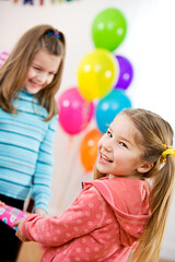 Obraz na płótnie Canvas Birthday: Cute Girl Excited To Get Party Gift