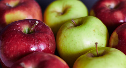 Bright red apples and a green apples