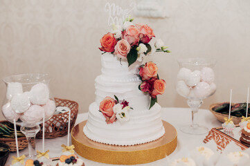 white wedding cake with flowers