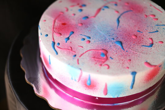 Colorful chocolate cake decorate with paint splash
