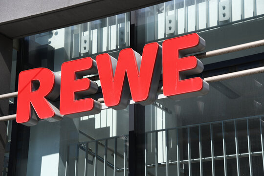 Hannover, Lower Saxony, Germany - April 12, 2020: Logo of REWE in Hanover, Germany - REWE is a German diversified retail and tourism co-operative group based in Cologne