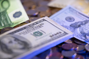 Fototapeta premium United States Federal Reserve currencies. Dollars next to Euro Banknotes. Paper Money and metal Money