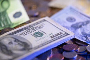 Fototapeta premium United States Federal Reserve currencies. Dollars next to Euro Banknotes. Paper Money and metal Money
